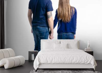 Man and woman hold hands on white background isolation, back view Wall mural