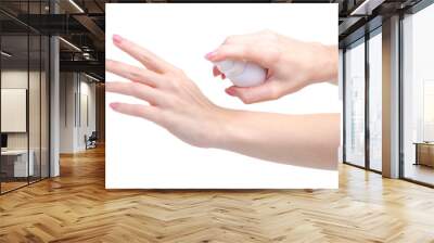 White bottle antiseptic antibacterial disinfection in hand on white background isolation Wall mural