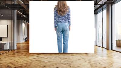 Woman in jeans and vest standing looking on white background isolation, back view Wall mural