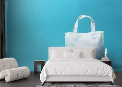 White Tote Bag on Teal Background - Eco-Friendly, Minimalist, Fashion Accessory Wall mural