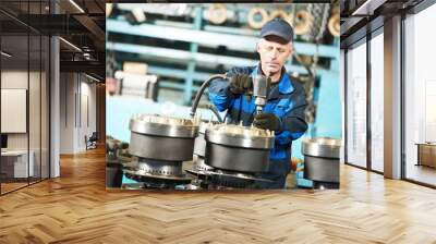 assembler worker at tool workshop Wall mural