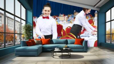 Catering restaurant waitress serving table with food Wall mural