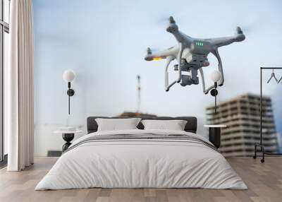 Drone over construction site. video surveillance or industrial inspection Wall mural