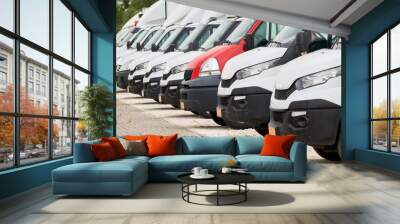 Fleet of commercial lorry trucks in row. Logistics and transportation service company Wall mural