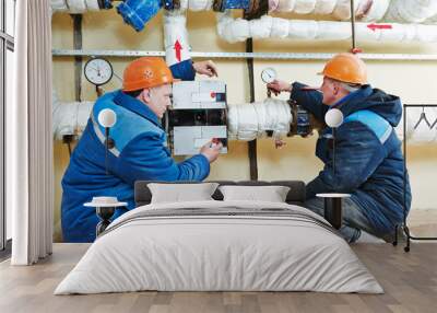 heating engineer repairman in boiler room Wall mural