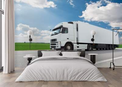 white lorry with trailer over blue sky Wall mural