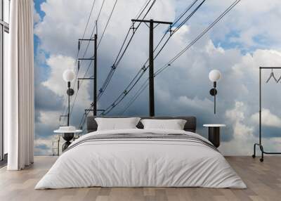 Cloudy with electric poles. Wall mural