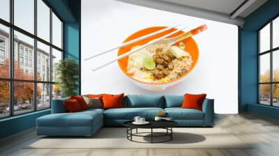 Instant Noodle in orange bowl on the white backgroun Wall mural