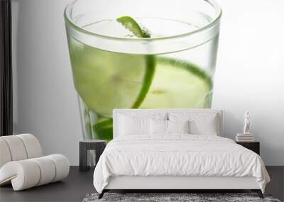 Lemon drink whit lime slices isolated on a white background. Wall mural