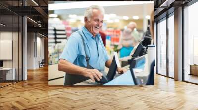 A happy supermarket cashier at work Wall mural