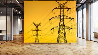 High voltage towers at sunset Wall mural