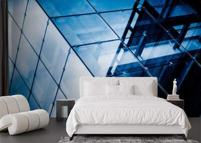 modern glass building with reflection,blue toned. Wall mural