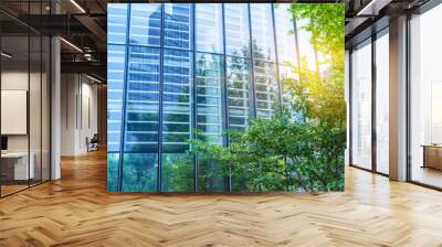 modern office building with green trees Wall mural