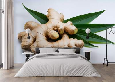 A closeup of fresh ginger root and green leaves perfect for healthy food and wellness concepts 
 Wall mural