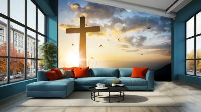 cross on blurry sunset background . Wall mural