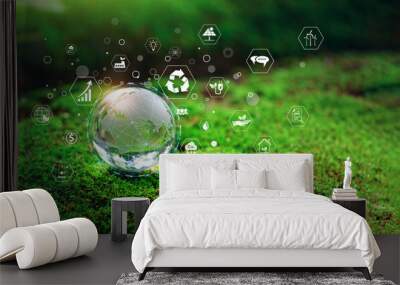 Glass globe in green forest with the icon environment of ESG, co2, circular company, and net zero. Technology Environment, Organization Sustainable development environmental. Wall mural