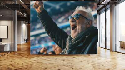 Elderly man celebrating in football stadium stands, happy man with goal in football match Wall mural