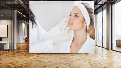 A scene of medical cosmetology treatments botox injection. Wall mural