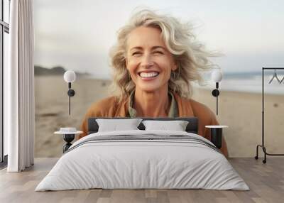 AI generated image of happy mature woman at the beach Wall mural