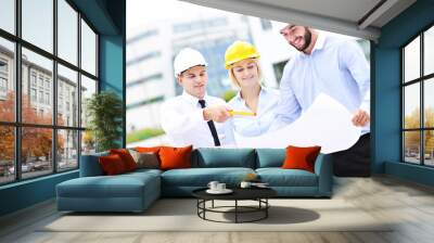 group of young architects on site Wall mural