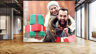 Picture of couple shopping for Christmas in the city Wall mural