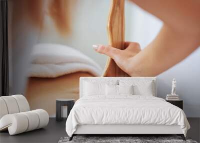 Woman at massage therapy with wooden tools Wall mural