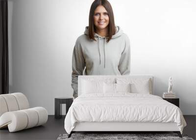 Young woman in gray hoodie isolated Wall mural