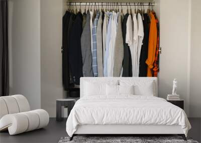 Many man's clothes in wardrobe, closeup. White wardrobe Wall mural