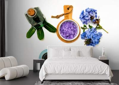 Beautiful spa composition .  Blue flowers and candlelight on a white background Wall mural