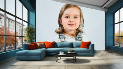 Portrait of 2 year old happy smiling baby on white background.  Wall mural