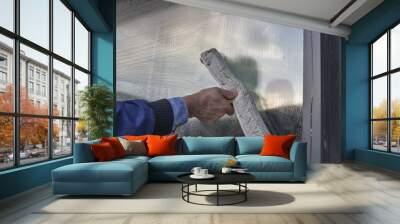 Hand cleaning window of a building 2 Wall mural