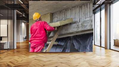 man installing external wall insulation 2 Wall mural