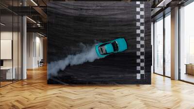 Aerial top view car drifting diffusion race drift car with lots of smoke from burning tires on speed track, Professional driver drifting car with lots of white smoke . Wall mural