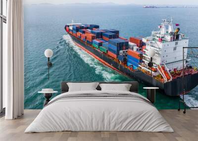 Aerial view cargo container ship sailing, container cargo ship in import export and business logistic and transportation of international by container ship, view from above business background. Wall mural