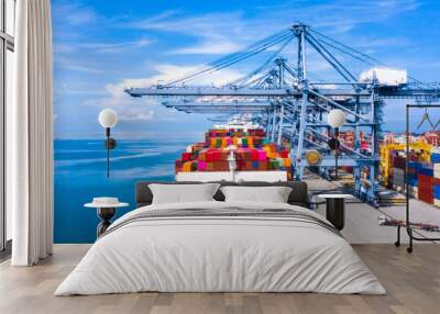 Aerial view container cargo ship freight shipping unloading at original destination port with quay crane, Business commercial global oversea logistic import export container box by container vessel . Wall mural