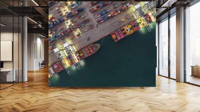 Aerial view container ship working at night terminal dock seaport, Global business company import export logistic transportation international container cargo freight shipping cargo vessel worldwide. Wall mural