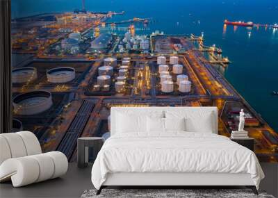 Aerial view oil and gas terminal storage tank farm,Tank farm storage chemical petroleum petrochemical refinery product, Business commercial trade fuel and energy transport by tanker vessel. Wall mural