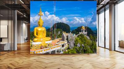 Aerial view Tiger Cave Temple, Buddha on the top Mountain with blue sky of Wat Tham Seua, Krabi,Thailand Wall mural