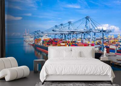 Container cargo ship at industrial port in import export business logistic and transportation of international by container cargo ship in the open sea. Wall mural