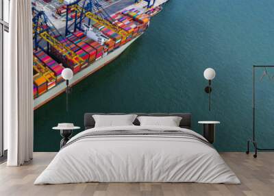 Container ship carrying container box in import export with quay crane, Global business cargo freight shipping commercial trade logistic and transportation oversea worldwide by container vessel. Wall mural