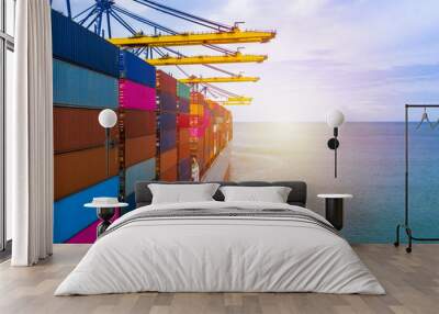 Container ship carrying container box in import export with quay crane, Global business cargo freight shipping commercial trade logistic and transportation oversea worldwide by container vessel. Wall mural