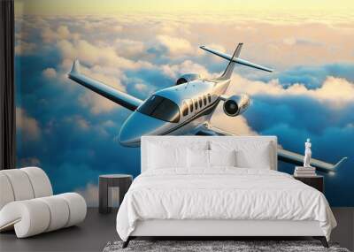 A sleek private jet soars above a sea of clouds during sunset, symbolizing luxury travel and high-altitude aviation. Wall mural