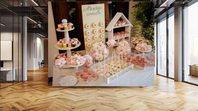 a beautiful table with sweets and various cakes general plan Wall mural