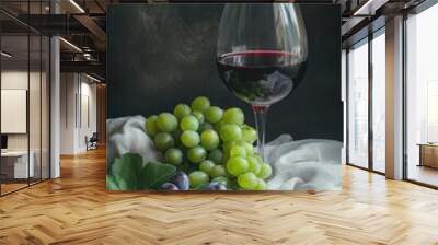 Glass of Red Wine with Grapes on a Wooden Table Wall mural