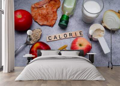 The inscription calorie next to healthy food products Wall mural