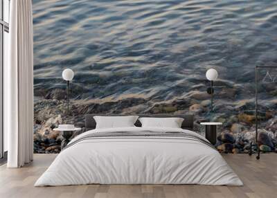 Clear water in the sea. Rocky shore of the black sea. Relaxing salt water. Holiday at sea. Wall mural