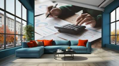 Financial accountants are checking documents from the finance department, verifying company financial figures for accuracy and not to be fraudulent. Concept of corporate financial auditing. Wall mural