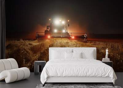 A robotic harvester with bright LED work lights operating efficiently in a field at night, showcasing its 24/7 harvesting capabilities Wall mural