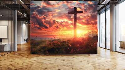 A rugged wooden cross silhouetted against a dramatic sunset sky (Good Friday) Wall mural