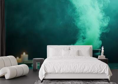 A mysterious cauldron emitting green smoke, surrounded by candles and books, evoking magic and enchantment in a dark setting. Wall mural